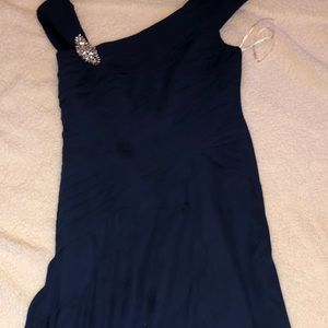 Dark navy long formal dress with broach.